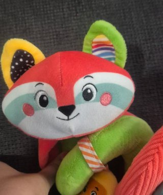 Juguete espiral para silla de bebé