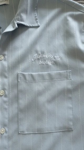Camicia a righe azzurra