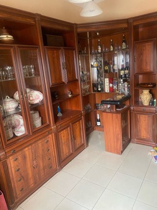 Mueble de rincón madera y cristal