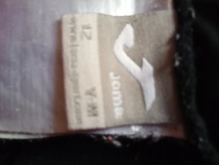 Pantalón chándal Joma negro