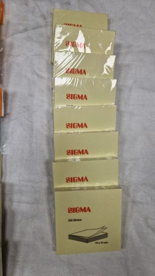 Lotto di 10 buste SIGMA e 5 confezioni TAK-TO