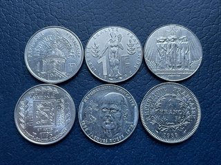 Tre tipi diversi di monete da 1 franco francese