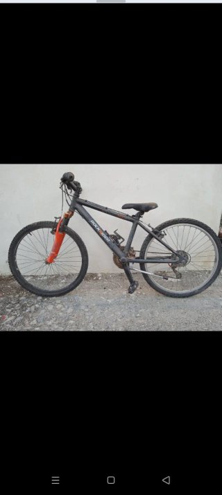 Bicicleta Montaña Negra y Naranja