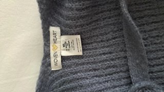 Jersey gris con espalda abierta