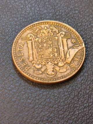 1 Peseta 1963 error acuñación con exceso de metal.