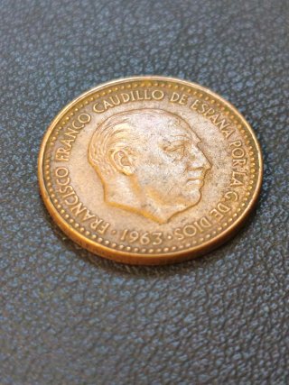1 Peseta 1963 error acuñación con exceso de metal.