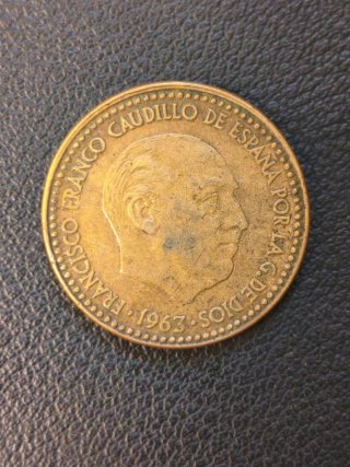 1 Peseta 1963 error acuñación con exceso de metal.