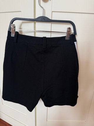 Shorts negros Mangata con rayas laterales