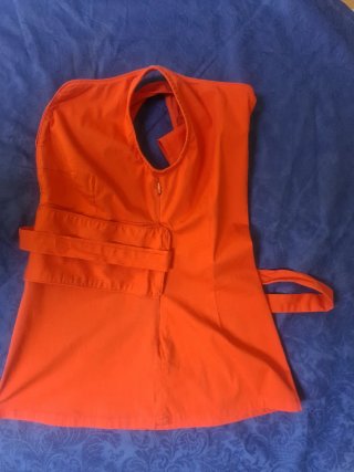 Top peplum rojo coral sin mangas con lazo Talla 36