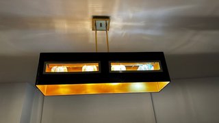 Lámpara de salón marron y dorada