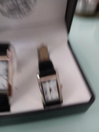 Reloj de cuarzo plateado y negro
