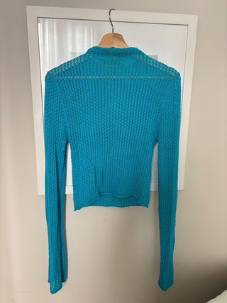 Jersey azul de cuello alto
