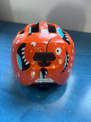 Casco Infantil Abus Naranja Monstruos