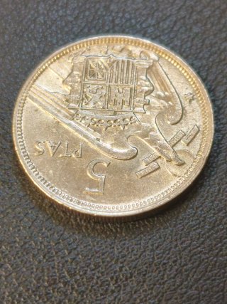 5 Pesetas 1957 con error acuñación de borde doble.