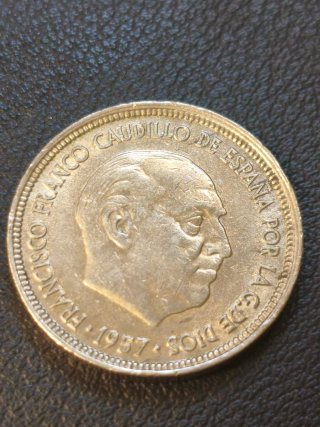 5 Pesetas 1957 con error acuñación de borde doble.