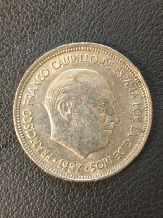 5 Pesetas 1957 con error acuñación de borde doble.