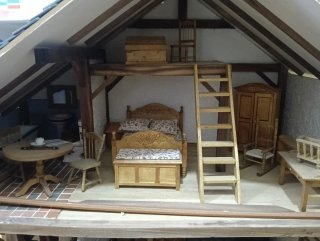 Casa de muñecas de madera