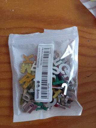 Lote abalorios y cordones para manualidades.