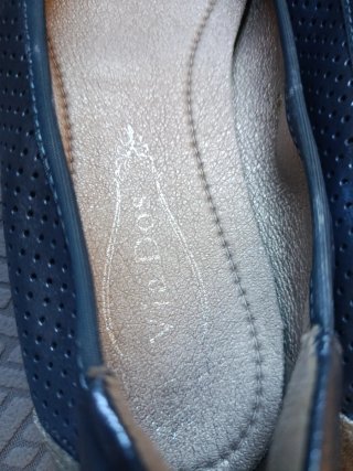 Zapatos planos azules con lazo