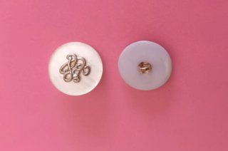 Conjunto de 26 botones anacarados con diseño