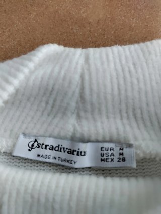 Jersey blanco de cuello alto