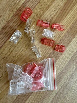 10 Conectores RJ45 Transparentes y/o Rojos