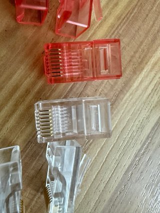 10 Conectores RJ45 Transparentes y/o Rojos