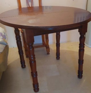 Mesa de comedor redonda de madera