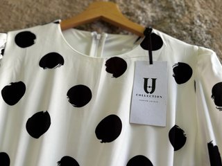 Vestido blanco con lunares de Forever Unique