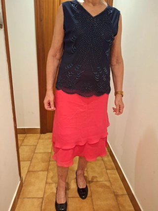 Falda gasa fucsia volantes
