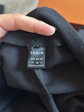Pantalones cortos negros con cinturón