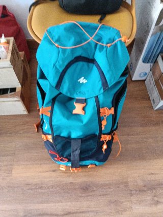 Mochila colonias Naranja y Turquesa