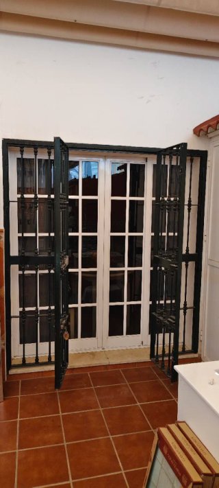 Cierre de hierro 4 puertas abatibles
