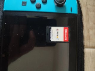 Nintendo Switch Roja y Azul con Funda i reloj