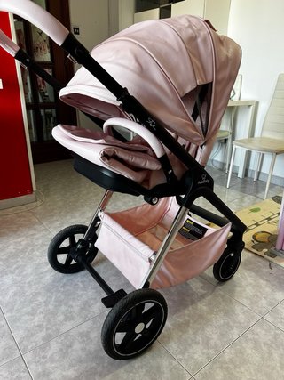Silla de bebé rosa marca Adababy 22kg