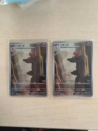 Carta pokemon Charizard y otras