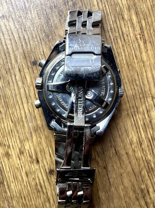 Reloj estilo Breitling Chronomat de acero inox.
