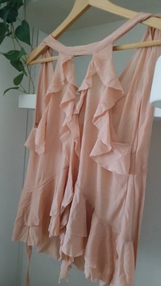 Blusa rosa con volantes
