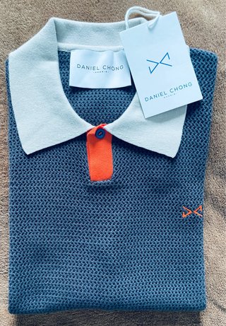 Polo del diseñador Daniel Chong