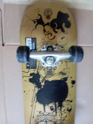 Longboard Negro y Oro Decathlon