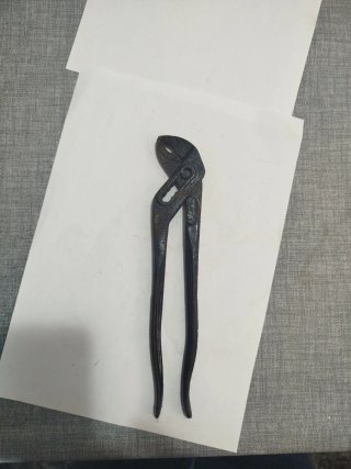 Llave de pato ajustable