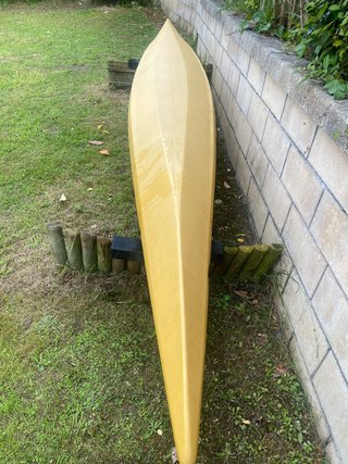 Kayak de mar y travesía amarillo con accesorios