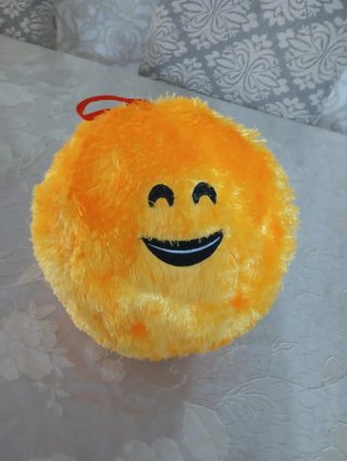 Peluche palla morbida gialla con faccia