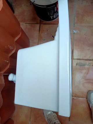 Pila de porcelana blanca para lavadero