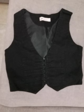 Chaquetilla negra con cordones