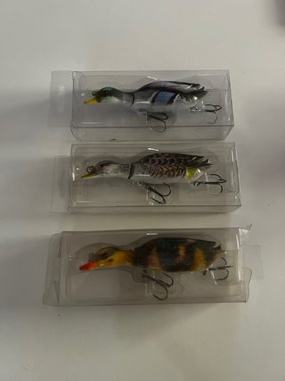 Señuelos de pesca en forma de pato