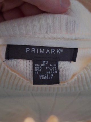 Camiseta beige de punto manga corta
