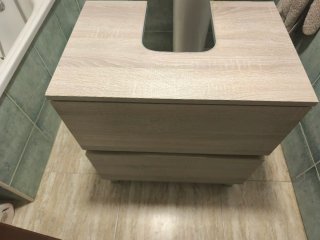 Mueble de baño de madera con cajones