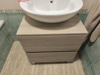 Mueble de baño de madera con cajones