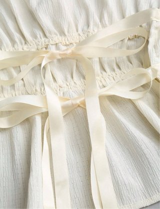 Conjunto beige halter y pantalón palazzo